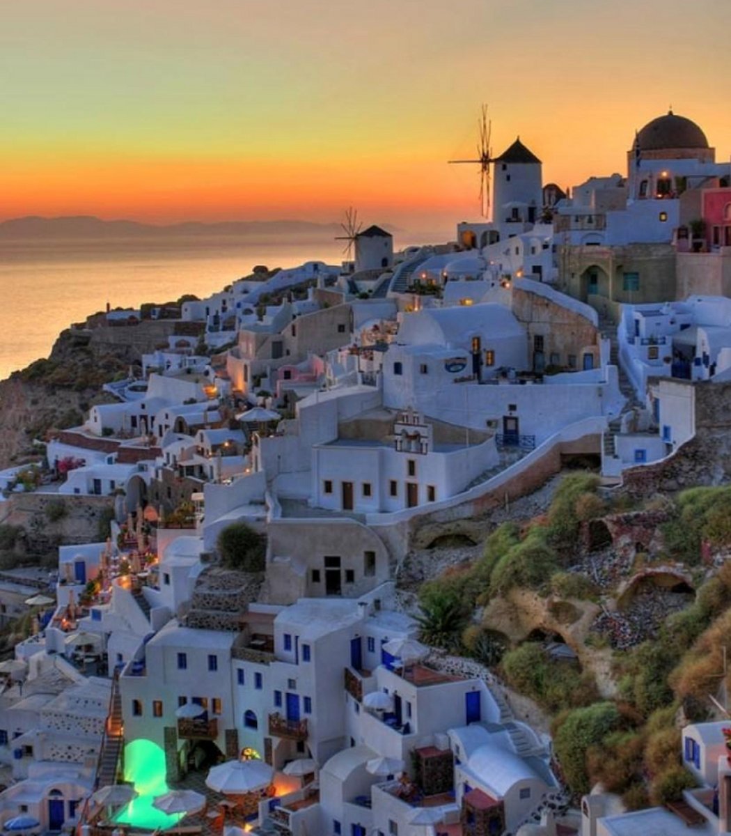 CarolGoehring1's tweet photo. Just caught the most magical sunset over Santorini’s white-washed rooftops—golden light painting every arch, and the only sound was the gentle Aegean breeze. Pure travel magic right here. https://t.co/IxrezLKxLU