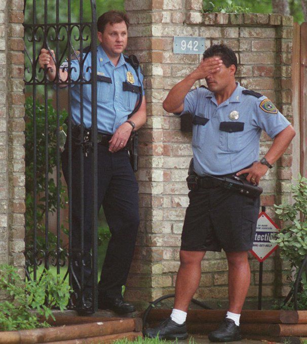 fasc1nate's tweet photo. Houston police officers stand outside the house where five children were found dead in Clear Lake on Wednesday, June 20, 2001. 

The mother, Andrea Pia Yates, was said to be on medication for depression and was arrested and charged with five counts of capital murder.

The most haunting photos ever taken: https://t.co/POrqRRccxc