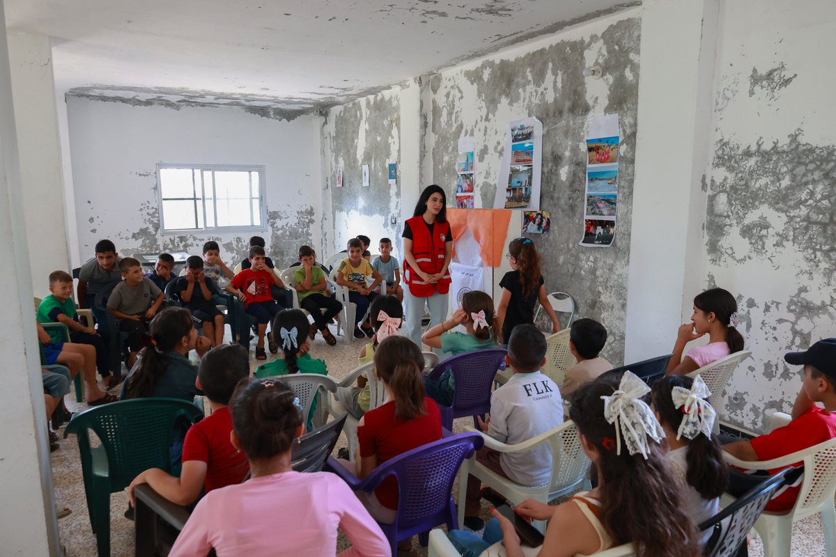 SYRedCrescent's tweet photo. Volunteers engaged 70 children in Basramun and Bouydat Muslim, rural #Tartous, in interactive activities on humanitarian work and its principles. They shared roles and practiced helping others with support from @ifrc. #SARC https://t.co/o8f3ywdOEu