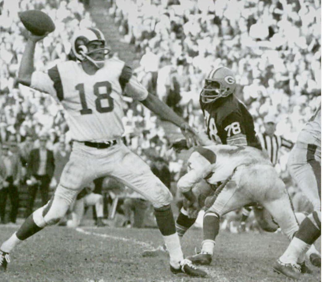 RomanGabriel3rd's tweet photo. #Throwbackmemory 1967 RG #18 @lacoliseum @RamsNFL @packers Excited about Rams bringing back the classic White & Blues ! #memories https://t.co/iuJOMVU9N1