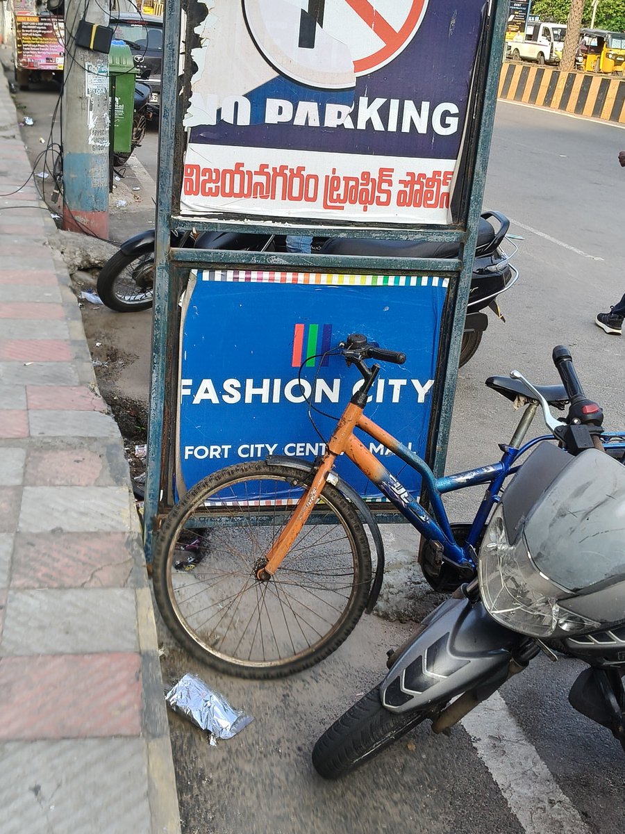 BKC22002's tweet photo. @PoliceVzm sir. People are neglecting no parking boards. Near SVN hotel https://t.co/5dVS4xcdf4