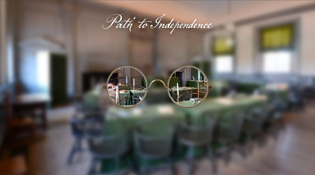 Round spectacles focus on Independence Hall.