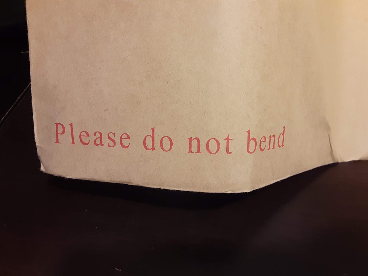 RakunSenpai's tweet photo. Years ago I bought a sign poster from John Romero and it was delivered bent to fit into my mailbox. https://t.co/8jnknaFEfk