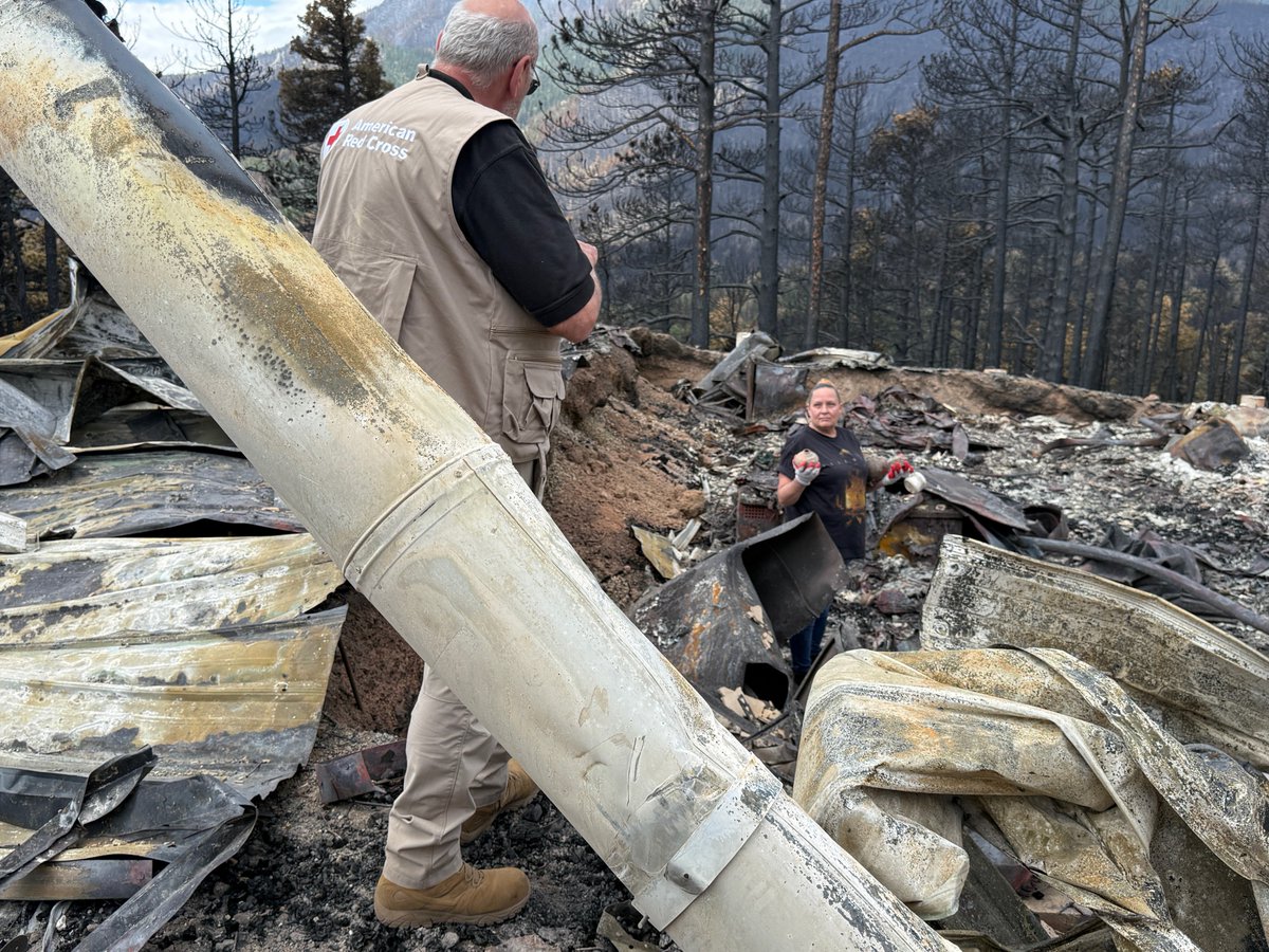RedCross's tweet photo. Returning home after a wildfire is one of the hardest moments a survivor can face. For Jim, it meant saying goodbye to a home he spent 25 years building.

When Jim returned for the first time after the Aspen Acres Fire in Colorado, he and his daughter, Julia, walked through the remains together, reflecting on all they had lost. Among the debris, Julia found several decorative pots that had survived the fire and carried them back to her father.

In that difficult moment, @COWYRedCross Disaster Mental Health volunteer Mike Baker was there to listen, support, and help the family begin processing what came next.

For Jim, returning home brought painful confirmation of what the fire had taken. But he didn't have to face that moment alone.

In the days, weeks and months after a disaster, recovery is about more than rebuilding homes. As families navigate grief, loss and uncertainty, disaster mental health volunteers are there to help them face the road ahead. ❤️