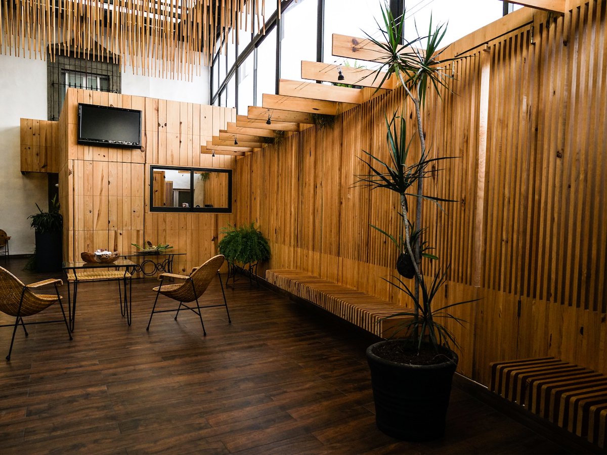 Architizer's tweet photo. Inside a heritage-protected hospital, a new medical wing uses steel and pine-wood latticework to create warm, flexible interiors. The wood partitions also become benches and built-in surfaces, giving the clinical spaces a more domestic feel.

📍 Cuernavaca, Mexico
Project by: WIDOARQUITECTOS
Photos by: Karime Valencia
Details: https://t.co/eqXoSMREWm