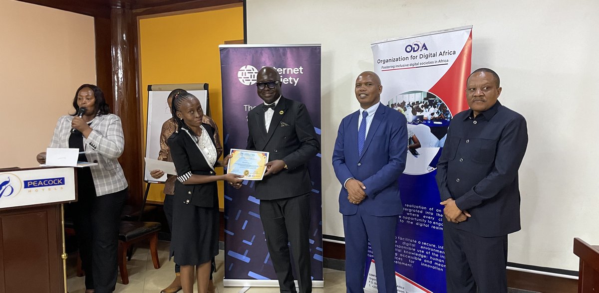 ElizaSamwel's tweet photo. Receiving the certificate of participation at Tanzania Internet Governance Forum 2026 from the Guest of Honour Dr Nkundwe Moses Mwasaga, Director General of Tanzania ICT Commission. #TIGF2026 #internetsociety https://t.co/cUJVpi19Bm