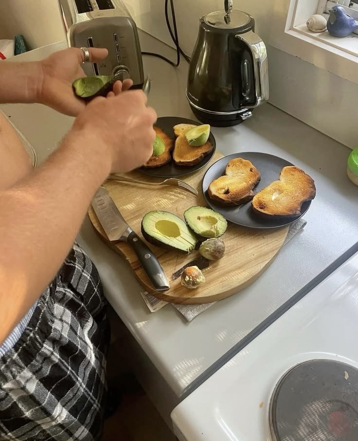 dzaenith's tweet photo. Shaan's tired eyes drifted toward the faint click of the toaster—he was making avocado toast for breakfast. Putting the knife, he placed the toast onto the plates before returning to the avocado, carefully slicing it into thin pieces. https://t.co/8S1MFR6Sxp