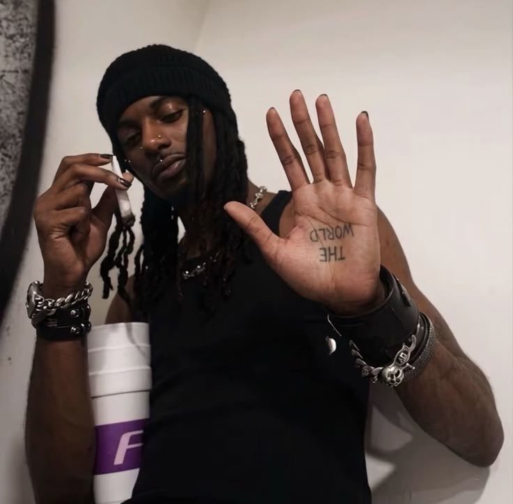 Sound_Scrape's tweet photo. Lil Wayne’s ‘The World’ Palm Tattoo. 

This tattoo style would later be adopted by Playboi Carti, Lil Uzi Vert, &amp; BruceDropEmOff. https://t.co/i0GZtxa8za