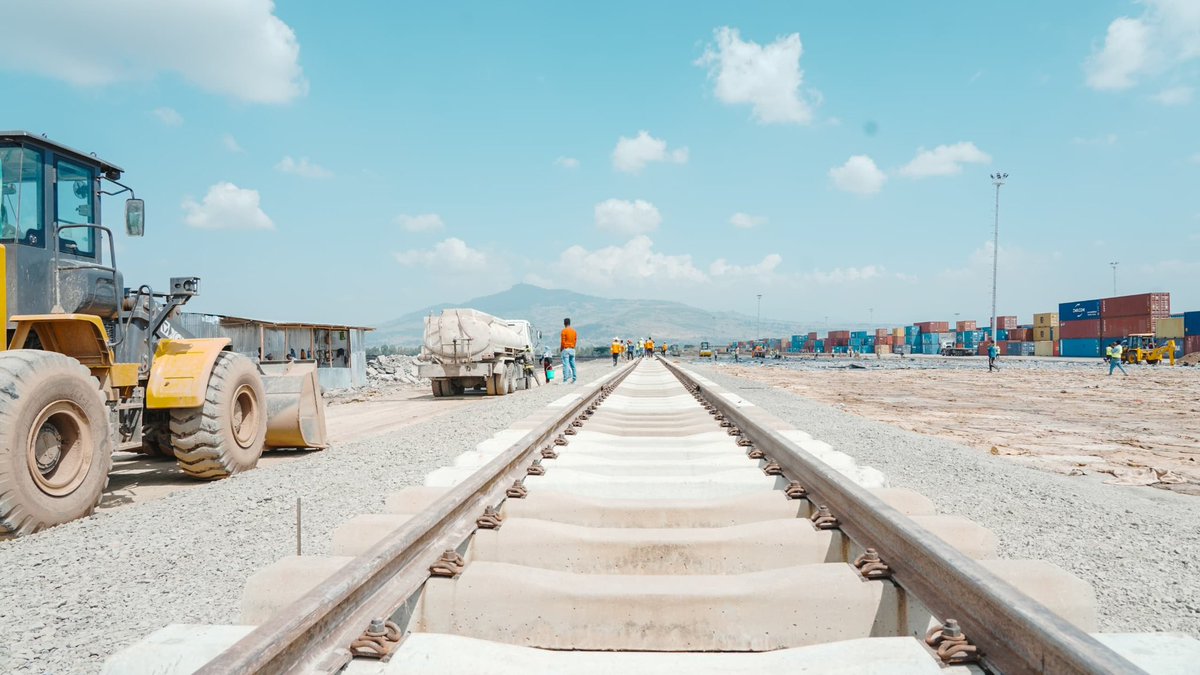 TakeleUma's tweet photo. Two Years on the Corridor: A Reflection

Two years ago, when we assumed leadership of the Ethio-Djibouti Railway Share Company, there was nothing glamorous about the task ahead of us.
Nine locomotives ran out of a fleet of thirty-five; the rest sat silent in sheds and parking lots. More than half of our wagons, flat cars and box cars alike, gathered dust. An enormous national asset lay unproductive, and more than 4,000 of our own people stood by as spectators to a railway that barely moved. When trains did run, they crawled at 20 to 30 kilometers per hour with a handful of containers behind them. We struggled to pay salaries. We stood at the edge of bankruptcy.

Today, that story has been rewritten.
The company once known for its fading presence on the corridor is now its most capable operator: profitable, growing, and shaping the flow of Ethiopia’s trade. Our trains run coupled and at full capacity, moving over 14×106 containers a day alongside 3,000 tonnes of bulk cargo. Annual carrying capacity has climbed from 1.3 million to 4 million tonnes. Our share of national exports has risen from 9% to 50%, and of imports from 11% to 25%. And every piece of maintenance and rolling stock work is now done entirely by our own local hands.
The expertise we forged repairing track has grown into something larger still: today we are fully committed to developing railway infrastructure, including ports and terminals.
None of this was inevitable. It was earned, train by train and repair by repair, by the hands of our people.
At this moment of reflection, I am deeply grateful to our Prime Minister @AbiyAhmedAli, whose support and guidance have been instrumental at every step of the way.
To our staff: what we have built is momentum. What comes next is movement, all along the corridor.