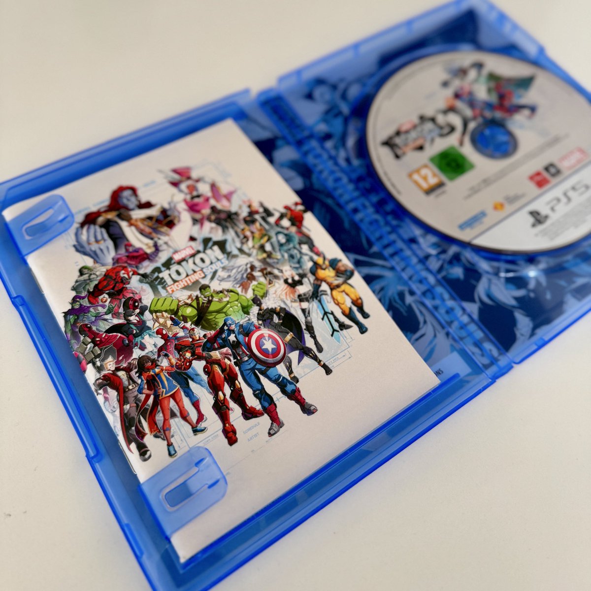 2_Old_4_Gaming's tweet photo. I bet my copy of Marvel Tokon has something yours doesn’t! https://t.co/29OfK4j6bs