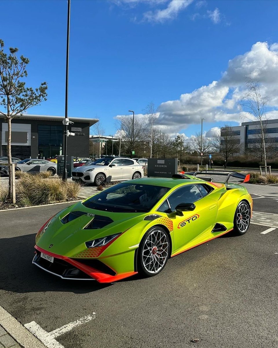 mommaraney's tweet photo. Vivid green and orange Lamborghini Huracán STO shining bright under the blue sky. 💚 https://t.co/pZyHPgVTmh