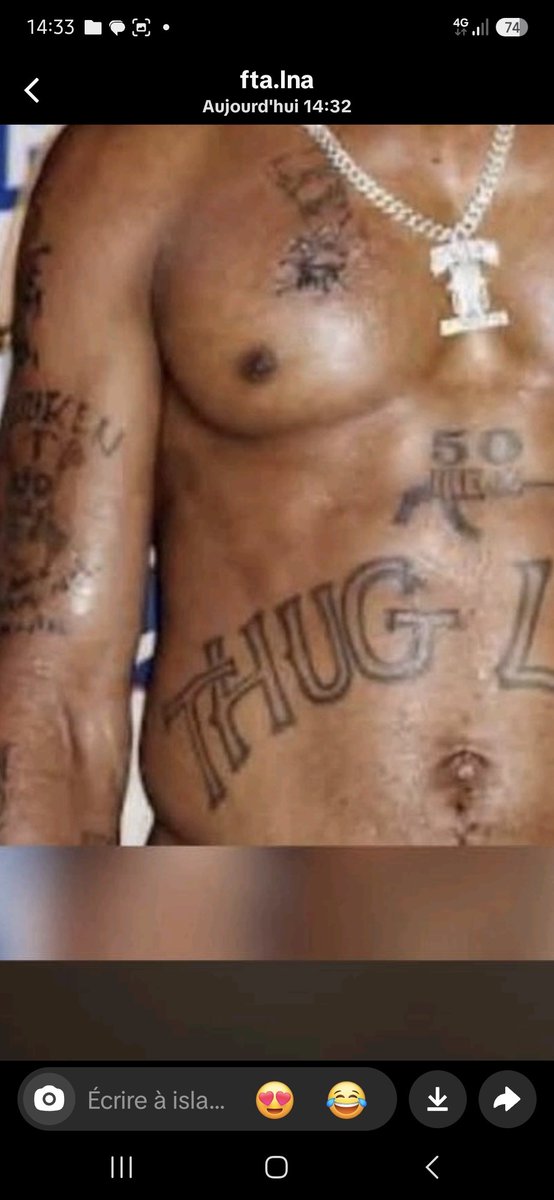 FerhatA08's tweet photo. @1ONLY1QUEEN Look at the H of his thug tatto it don’t match they trying to fool all of us it’s not pac ! https://t.co/9IeviCA5UU