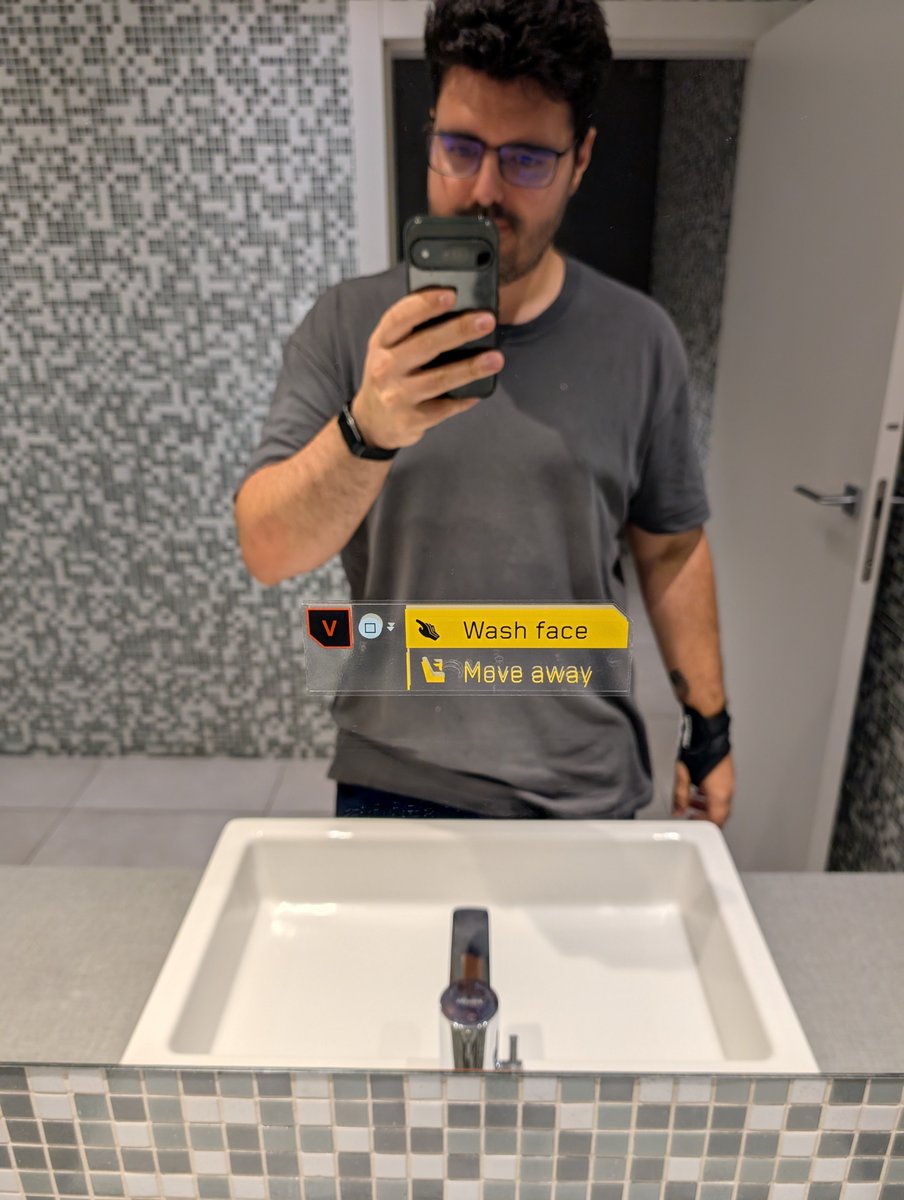 Shakarez's tweet photo. Don't know who added this to the office bathroom but nice Cyberpunk reference 😁 https://t.co/zEFSXjx99A