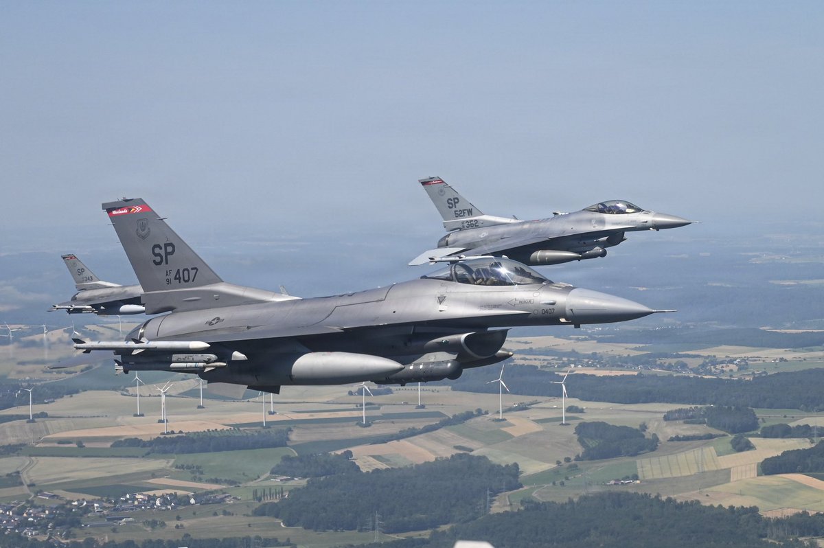 USNATO's tweet photo. An attack on one is an attack on all. NATO Allies exercise, share intel, and boost defense production together. F-16s from the 480th Fighter Squadron fly over Spangdahlem in Germany, delivering precision air power in support of NATO directives. https://t.co/CEnwPCyjFm