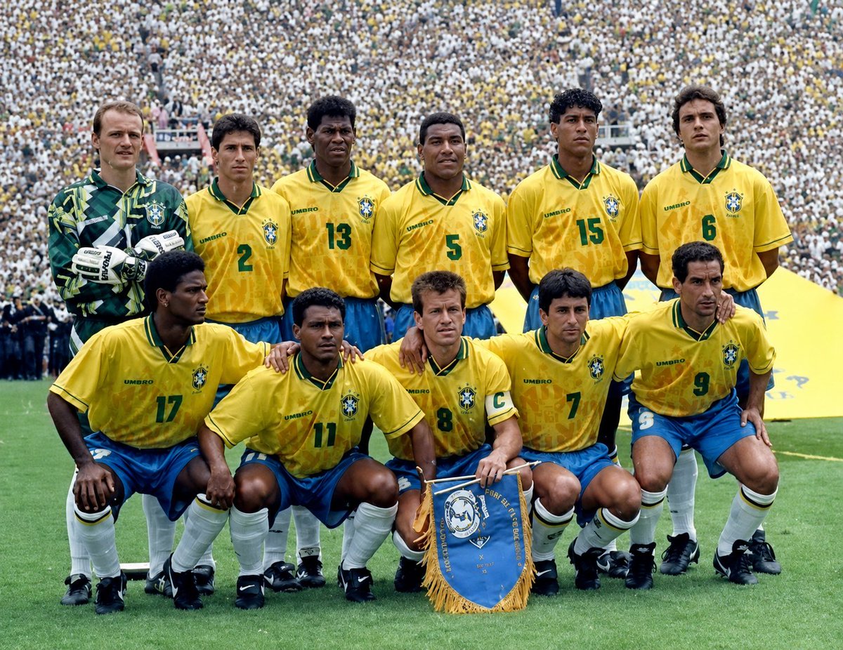 FBthenandnow's tweet photo. Legendary Brazil Squad that Won the 1994 World Cup
An immortal team that secured Brazil’s fourth World Cup title for the Seleção:
Cláudio Taffarel – Goalkeeper
Jorginho – Right-back
Aldair – Centre-back
Márcio Santos – Centre-back
Branco – Left-back
Mauro Silva – Defensive midfielder
Dunga – Captain, central midfielder
Mazinho – Midfielder
Zinho – Midfielder
Bebeto – Forward
Romário – Forward (Star of the tournament)
Coach: Carlos Alberto Parreira
That golden team of 1994 did not merely play football — they wrote one of the most glorious chapters in Brazilian football history: solid, determined, and full of inspiration.