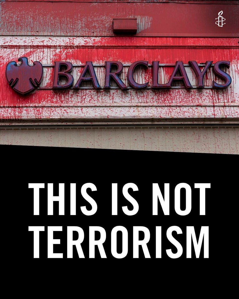 Photo of Barclays Bank spray-painted red. With copy that reads: this is not terrorism
