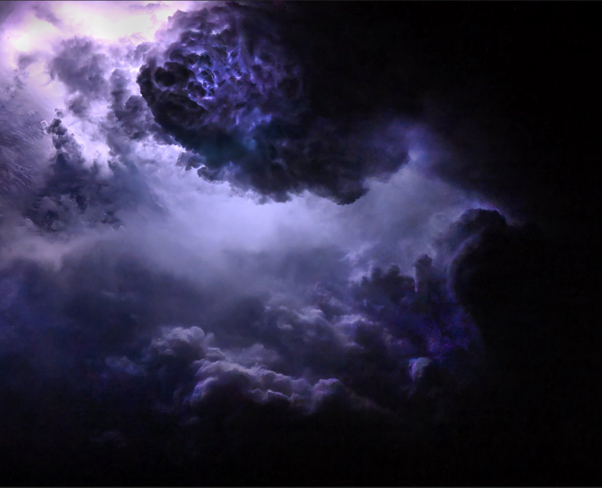 astro_Pettit's tweet photo. Nadir views from ISS of bright purple lightning flashing through clouds. These thunderheads can be upwards of 50,000 feet, higher than most planes fly, and so are best observable from orbit! I used a Nikon Z9 at 1/1200th shutter speed and 120fps to optimize for lightning detail. https://t.co/q2lBCTXezF