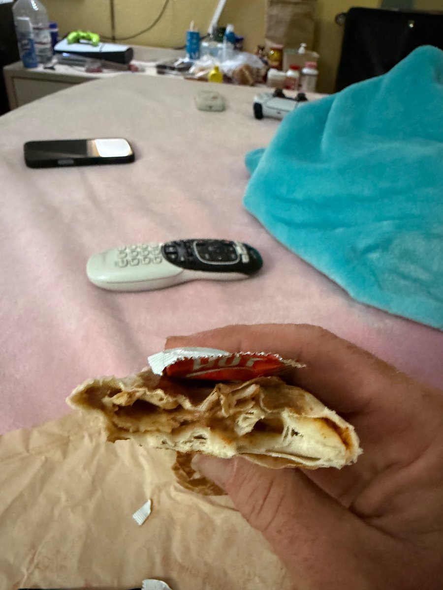 MeOnX2day's tweet photo. @tacobell We are tearing up over the amount of food you put in your burritos. Looks like I got a couple beans I guess. At least they grilled the tortilla like I asked this time. https://t.co/oGcAK6pEwF