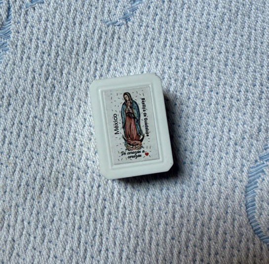 EthanLevins2's tweet photo. A cross and Virgin Mary photo was found on the body of Hezbollah commander Ali Al-Hajj Hassan. 

These were given to him in 2014 by Syrian nuns, when Hezbollah defended a Christian village against Al-Nusra terrorists. 

He was killed in an Israeli strike this week during the “ceasefire”