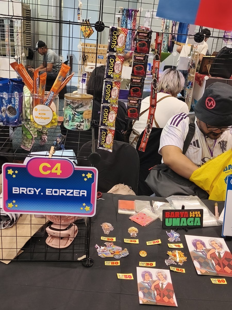 CailleaXIV's tweet photo. 🥹 had a chaotic start but we managed to pull through. Cosmic Market was a success! Thank you for all your support! Especially my buddies for helping us manage &amp; setup the booth. Featuring our chaotic booth, that amazing Tyrant shirt, my WoL exchange loot and my merch loot wheee! https://t.co/4YkKJvYgcM