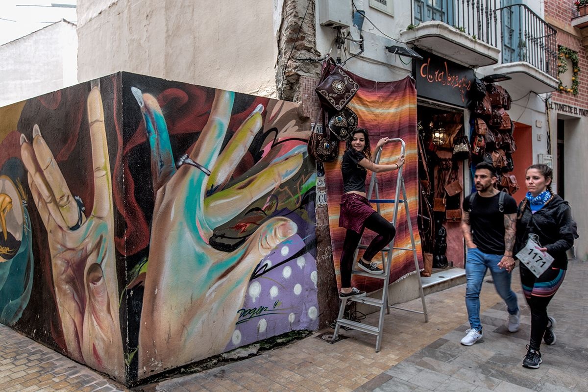 LocyKc's tweet photo. Chanced on a hidden street art alley today—vibrant murals turning the mundane into pure magic. Art’s just life made visible, right https://t.co/wkXHtvXHSN