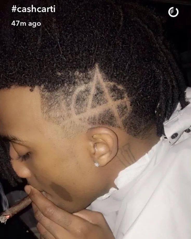 Sound_Scrape's tweet photo. Playboi Carti ’s anarchy symbol haircut design (2017) https://t.co/75FZSa5Wje