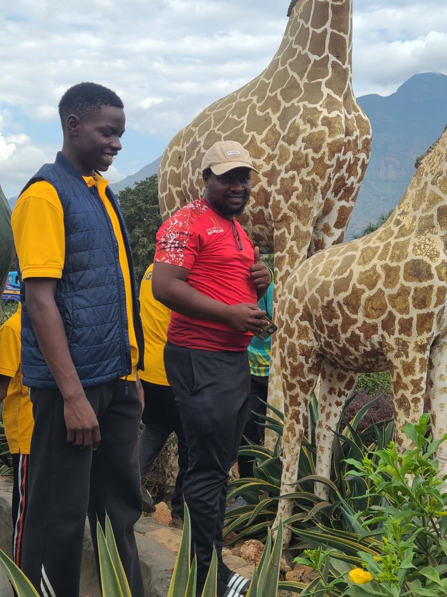 KinaawaKawempe1's tweet photo. From smashing opponents to smashing poses! 🏸📸

Our Badminton Boys are still enjoying their time in Tanzania, and today they took a break from the court for a tour around the Kilimanjaro Region! From sightseeing to striking their best tourist poses, the team visited several historical sites, including the famous monuments at the Moshi Roundabout. 🇹🇿

FEASSA bronze medalists by competition and tourists by holiday!
#KinaawaHSKawempe || #WeLearnToExcel