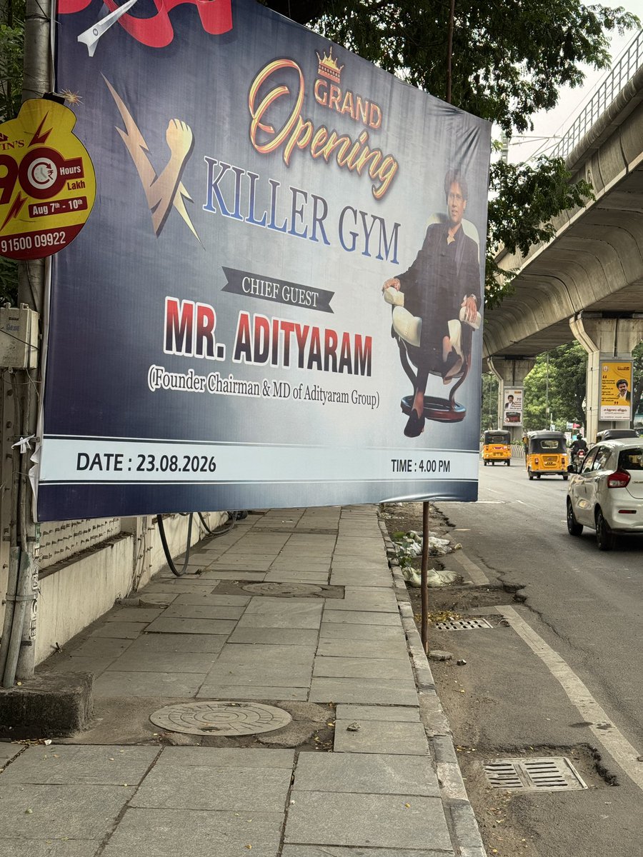 itissubhasree's tweet photo. This nonsense of erecting hoardings with dangerously flimsy savukku kattai on the pavement, what do you expect pavement walkers to duck under and go or jump 15 feet ?? Best would be to go under some bus on the speeding highway right ?!😡Need a blanket ban for this. Atrocious. @BussyAnand @tnhighwaysdept @chennaicorp