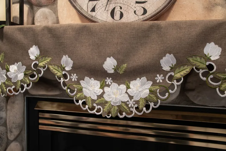 LinensArtThings's tweet photo. Beautiful floral Magnolia design Mantle Scarf on brown polyester linen, featuring exquisite embroidery and eye-catching cutwork to dress up any Fire Place Mantle. Other matching items are available and will add beauty to any home and impress your guests for years. #linens #doilies #homedecor #tablelinens #tablecloths #tabletopper #tablerunner #lace #LAT Watch Here: https://t.co/0i22oxDXNr