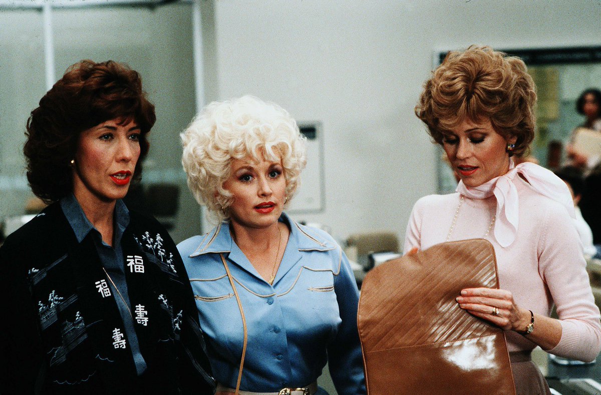 CinemaTweets1's tweet photo. I honored Dolly Parton this weekend the only way I know how: firing up Nine to Five (🌟🌟🌟🌟🌟) for the hundredth time. Rewatching a film that released in 1980, I’m reminded that this film was the start of something special in Cinema. Nine to Five ushered in the dawn of a new era in which films about female empowerment were finally given a small shred of the limelight: A League of Their Own, The First Wives Club & Thelma and Louise are all ‘90s films that walked down the path paved by the work done by Parton, Jane Fonda & Lily Tomlin in this exact film. All of which is a reminder that Dolly Parton was a trailer-blazer. She waited for no one. She changed my expectations of what a person can achieve in life. Rewatching this film after her passing & as the first of this trio to go? Painful as all hell. 

When you read tributes to Dolly Parton, I think it’s important to keep in mind some of the people paying tribute to Parton because one should always ask themselves “well, would Parton actually approve of this person who is now singing her praises when she’s gone?”. I don’t often get political in my reviews but it’s worth mentioning that in this film, Parton/Fonda/Tomlin play characters who are….gulp….socialists. They break down the barriers of capitalism, kidnap their boss, and proceed to implement company policies that include equal pay for male and females, on-site daycare, a company rehab program for substance abuse, flexible work house, and a job-sharing program. In other words, Parton/Fonda/Tomlin are all fighting for something 50 years ago that is still incredibly relevant today. 

There’s an extra emotional punch - something incredibly raw packed in a rewatch of this film - knowing that Parton/Fonda/Tomlin literally walked the walk in real life in the years after making this film. They didn’t just sign up for Nine to Five to make a fun movie that would sell at the box office. In the years after making this movie, all three of them advocated for women. They fought for equal pay. They stood for equal rights. 

I think that’s why losing Parton feels literally like a load of bricks - it feels like we are watching an era go by before our very eyes. If you were a ‘90s kid like me, I think you probably took for granted that people like Dolly Parton or Robert Duvall - those who were so damn good at their craft & did with sheer class - would just come around/be around forever. I was a fool for taking public figures like them for granted. We now recognize in this godless society how rare it is for someone like Parton to grace our presence. Gifted. Empathetic. Incredibly human. 

What made Parton so popular - other than her sheer talent for singing & acting - was her ability to relate to people. I can picture her literally moving publicists out of the way. She didn’t need media training, she was above PR. Parton spoke from the heart & shot from the hip and in doing so, connected with millions of people across the globe. Think about that, across the globe. Parton was international. The entire world is mourning her loss, not just America. It’s because she knew how to connect to a person’s soul without ever knowing anything about them. She was an honest, authentic artist. And we are losing them rapidly.