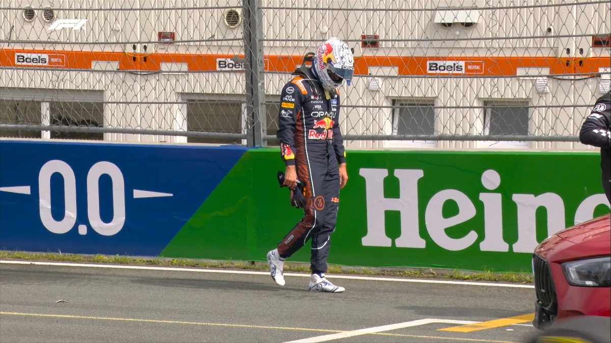 F1's tweet photo. Total heartbreak for Max in his final race at Zandvoort 💔

Verstappen makes his way back to the pits on foot

#F1 #DutchGP https://t.co/gjPiU34hbG