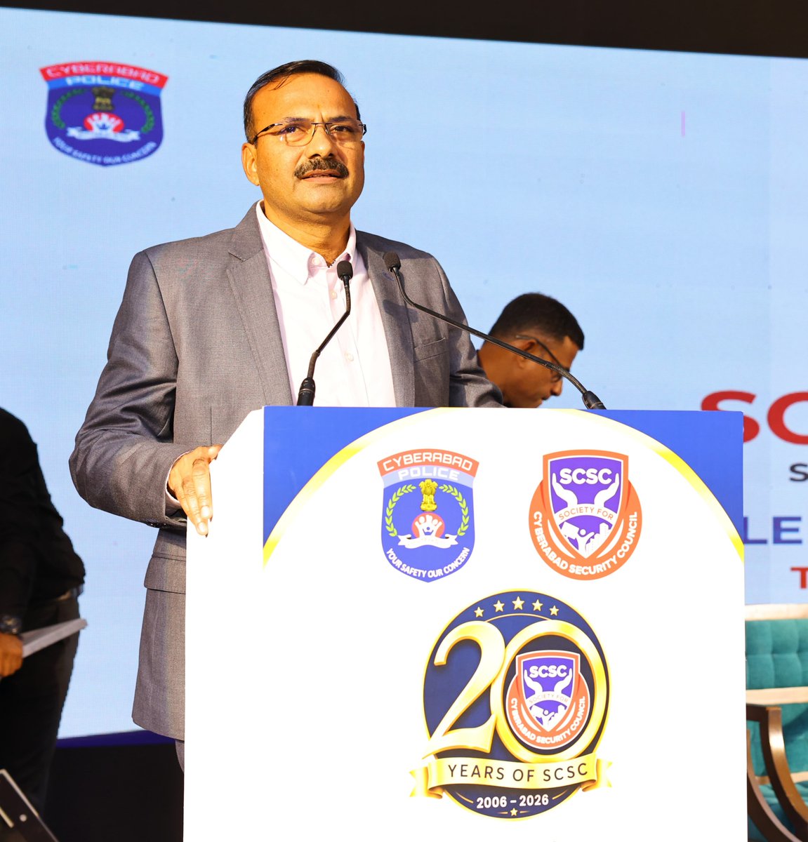 cyberabadpolice's tweet photo. SCSC Celebrates 20 Years of Trusted Partnership for a Safer Cyberabad

Two decades of police–industry–community collaboration strengthen safety, security and growth

SCSC @ 20 logo unveiled and commemorative book “Enabling Enterprise – 2 Decades of SCSC” launched

Hyderabad, August 23, 2026: The Society for Cyberabad Security Council (SCSC) celebrated its 20th Anniversary at AVASA Hotel, HITEC City, Hyderabad, marking two decades of successful partnership between the Cyberabad Police, industry and the community.

The event, themed “Celebrating Two Decades of Trustworthy Partnership, Security & Growth,” brought together senior police officials, government representatives, industry leaders, security experts, healthcare professionals, media and community stakeholders.

SCSC was formally established on August 23, 2006, with the objective of bringing the police, industry and community onto a common platform to address the emerging safety and security needs of the rapidly developing Cyberabad region.

Speaking on the occasion, Cyberabad Police Commissioner Dr. M. Ramesh, IPS, said that the safety and security of IT professionals and the wider IT community remains an important priority for the Cyberabad Police. He appreciated SCSC for its continued support to the police and for strengthening public–private partnership over the past two decades.

He recalled SCSC’s contribution during challenging periods, including the Telangana movement and the COVID-19 pandemic, when close coordination between the police, industry and other stakeholders helped address security, operational and community-related challenges.

The CP said that the partnership has evolved over the years from responding to problems to developing proactive and practical solutions to emerging challenges. He emphasised that continued cooperation between the police, industry and community is essential for building a safer and more resilient Cyberabad.

SCSC Journey

Dr. Krishna Yedula, Former Secretary General, SCSC, recalled the early days of the organisation and the development of the Cyberabad IT corridor. He said that the idea of SCSC emerged from discussions between the police and industry on the need for a safe and secure environment for the growing technology sector.

He recalled that extensive consultations and discussions on industry concerns and Standard Operating Procedures helped lay the foundation for the organisation, which formally took shape on August 23, 2006.

He said that SCSC has grown into a strong platform that brings different stakeholders together and has continued to evolve according to the changing needs of industry and society.

SCSC @ 20 Logo and Commemorative Book

A major highlight of the programme was the unveiling of the SCSC @ 20 logo and the launch of the commemorative book “Enabling Enterprise – 2 Decades of SCSC.”

The programme also featured an art performance by Ms. Nancy Sahu, Director, Strategic Relations, SCSC.