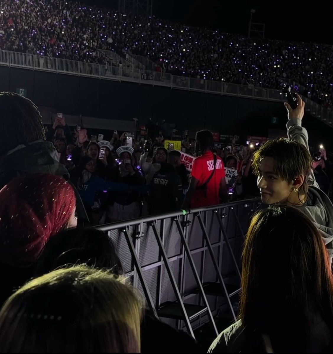 PeachySaiyan's tweet photo. Taehyung held my camera 

I’m done living now 

(That’s me in the red bandana) https://t.co/NZvit2KvHA