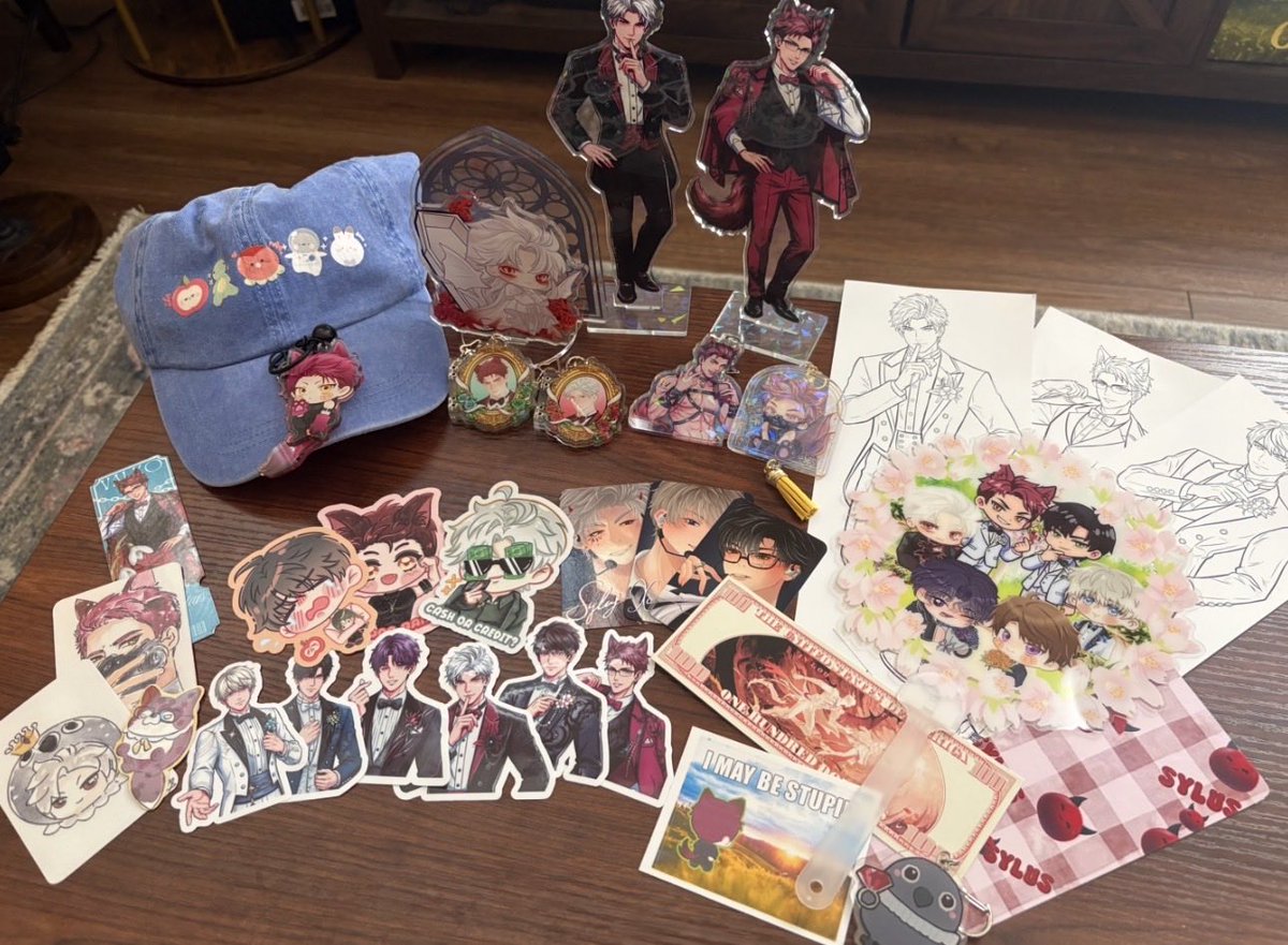 bellsy_bub's tweet photo. any money I would have spent in game was instead spent on fan-made merch this weekend! 

really enjoyed seeing all the love for Valko at this event 🐺💕

(Husband was a good sport and carried Sylus in his back pocket 🥰)

#全世界都爱敖尹
#NoValkoNoMoney
#BringValkoBack https://t.co/vmokz9VAYb
