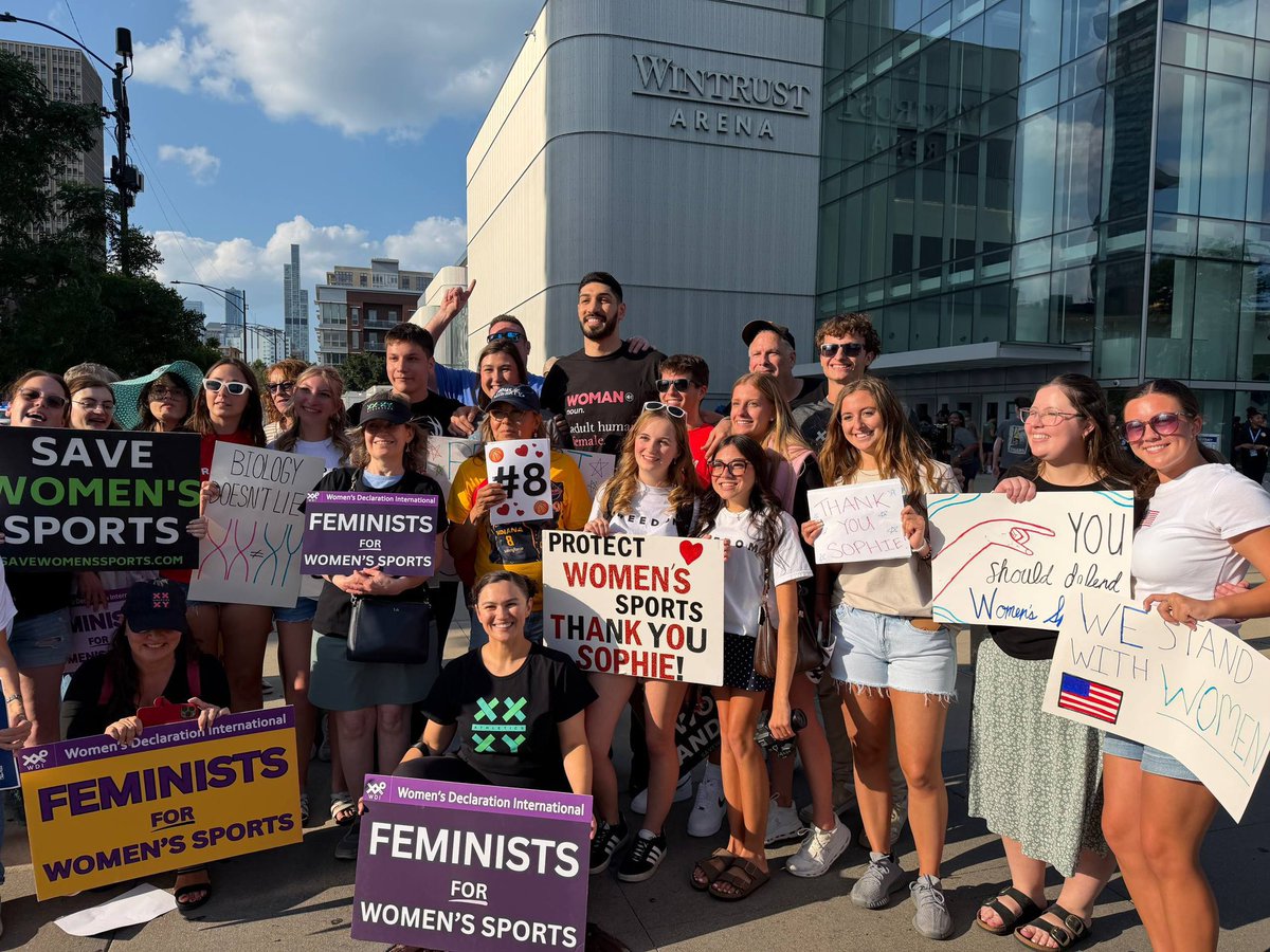 bennyjohnson's tweet photo. Enes Kanter Freedom rallies large crowd outside Fever-Sky game in Chicago tonight in support of Sophie Cunningham.

This is a movement the WNBA won't be able to ignore.

Women are flooding the game with "Protect Women’s Sports, "Thank You Sophie”, and “Save Women’s Sports" signs.

They can’t silence this.

Courageous women taking a stand for truth and biology⚡️

Great work @EnesFreedom and @A1Policy