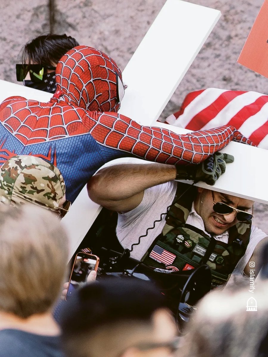 YourAnonCentral's tweet photo. Spiderman vs MAGA in Minneapolis. https://t.co/dl4nfsU989
