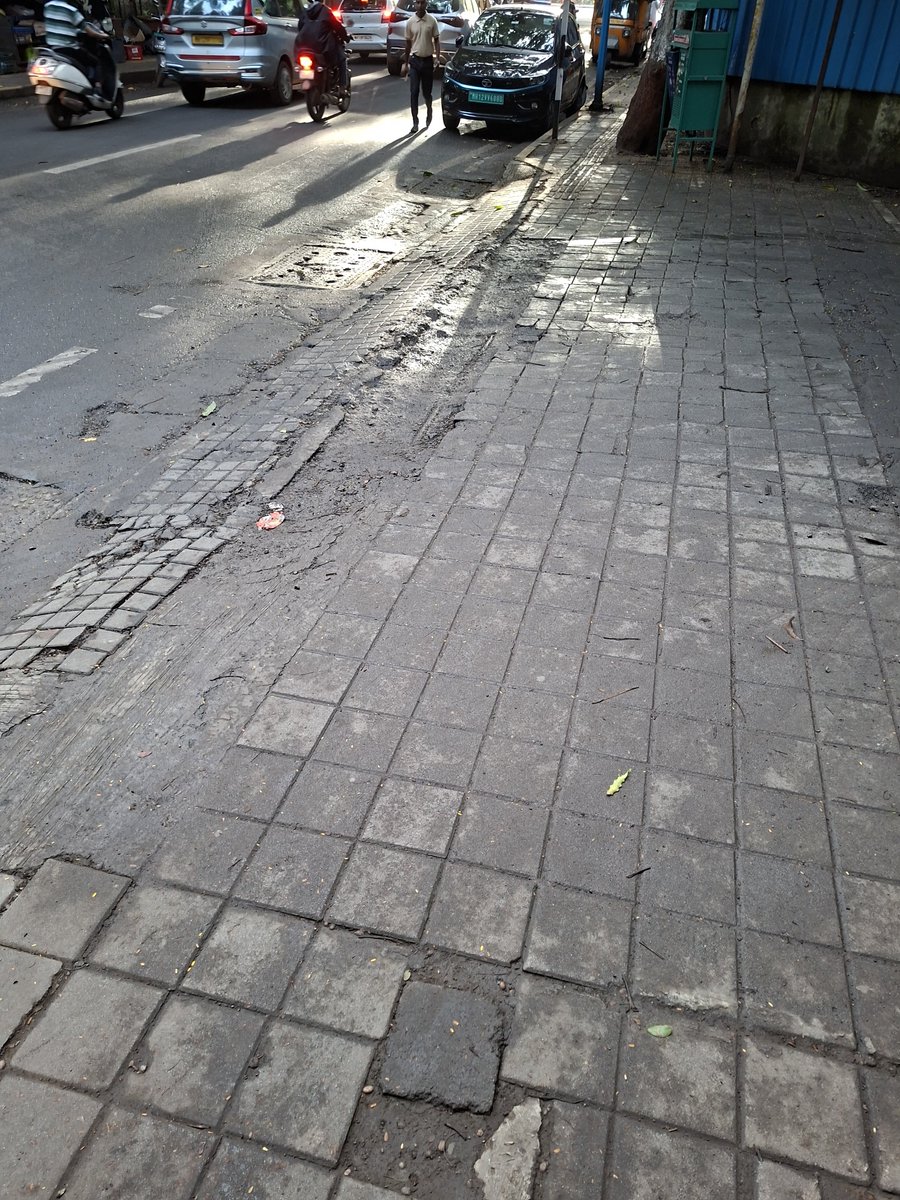 aparanjape's tweet photo. @PMCPune for many months, the footpath ramp at the beginning of Lane 11 Prabhat Road is broken...potholes, improper ramp, etc.

@SidShirole @navalMH https://t.co/M8qn9KpeRY