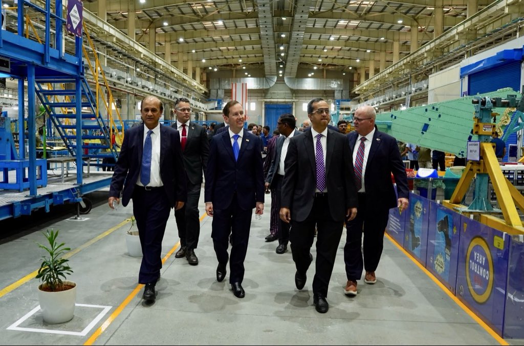 USAmbIndia's tweet photo. Fantastic visit to the @LockheedMartin-Tata facility in Hyderabad to see advanced aerospace manufacturing firsthand. Lockheed Martin’s partnership with Tata is making India a critical link in the global C-130J production network, strengthening defense supply chains and advancing our strategic partnership.