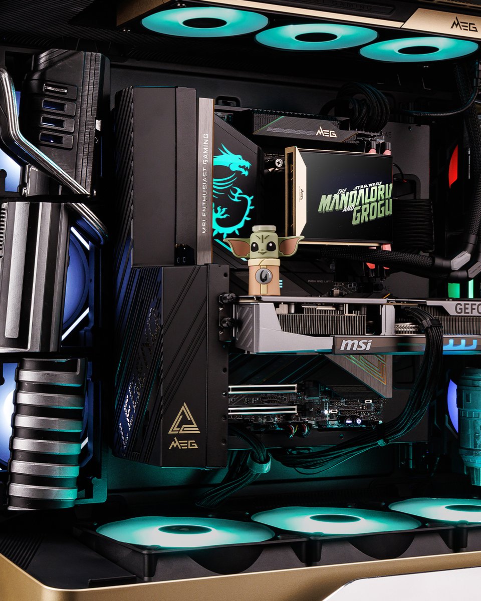 msigaming's tweet photo. The MEG 900R Mandalorian Case Mod has made its way to Cologne, bringing a little piece of a galaxy far, far away to the ultimate PC setup. 
 
The Force is strong with this one.
With Grogu by its side, this is the way.🫡
 
#MSI #MEG #Mandalorian #PCModding 
@StarWarsDE @starwars https://t.co/PA62DD2eHC