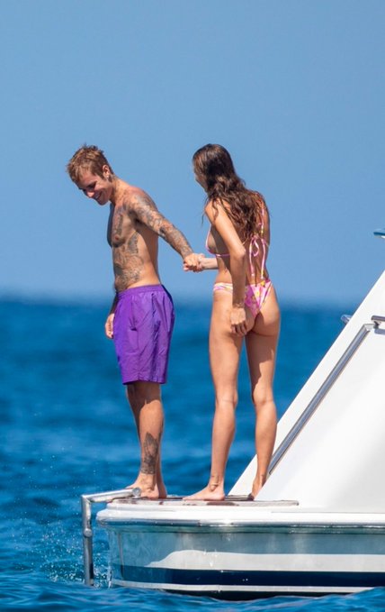 3301_Intel's tweet photo. Justin and Hailey Bieber spotted together in Ibiza..!! 👀🔥 https://t.co/wQ7S0V0yzU