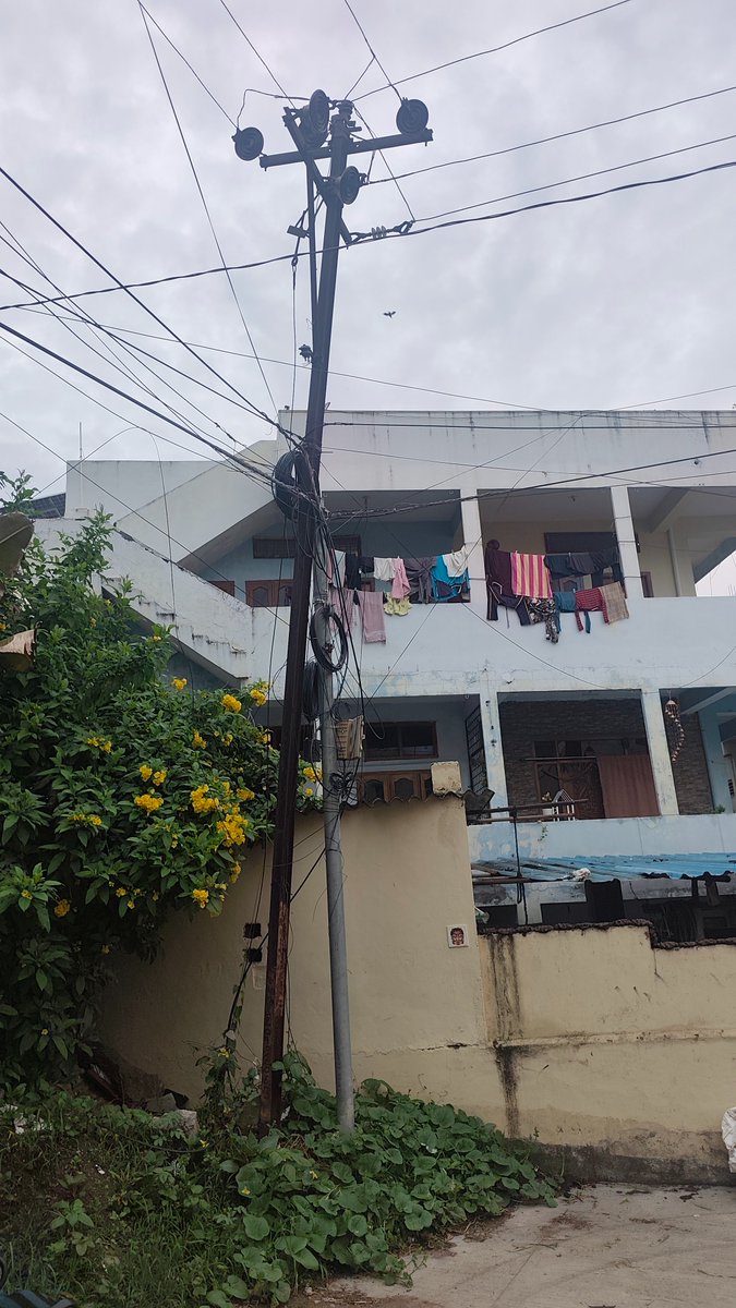 srikanthyadav20's tweet photo. @revanth_anumula @tgspdcl @HMWSSBOnline "Please take a look at the photos of the pole attached below. The pole is bent and currently hanging on the Jio pole wire. It might fall at any moment. Please inspect and fix it as soon as possible." Area ramshankar nagar Ramanthapur 500013 https://t.co/hm2Ot7JrnD