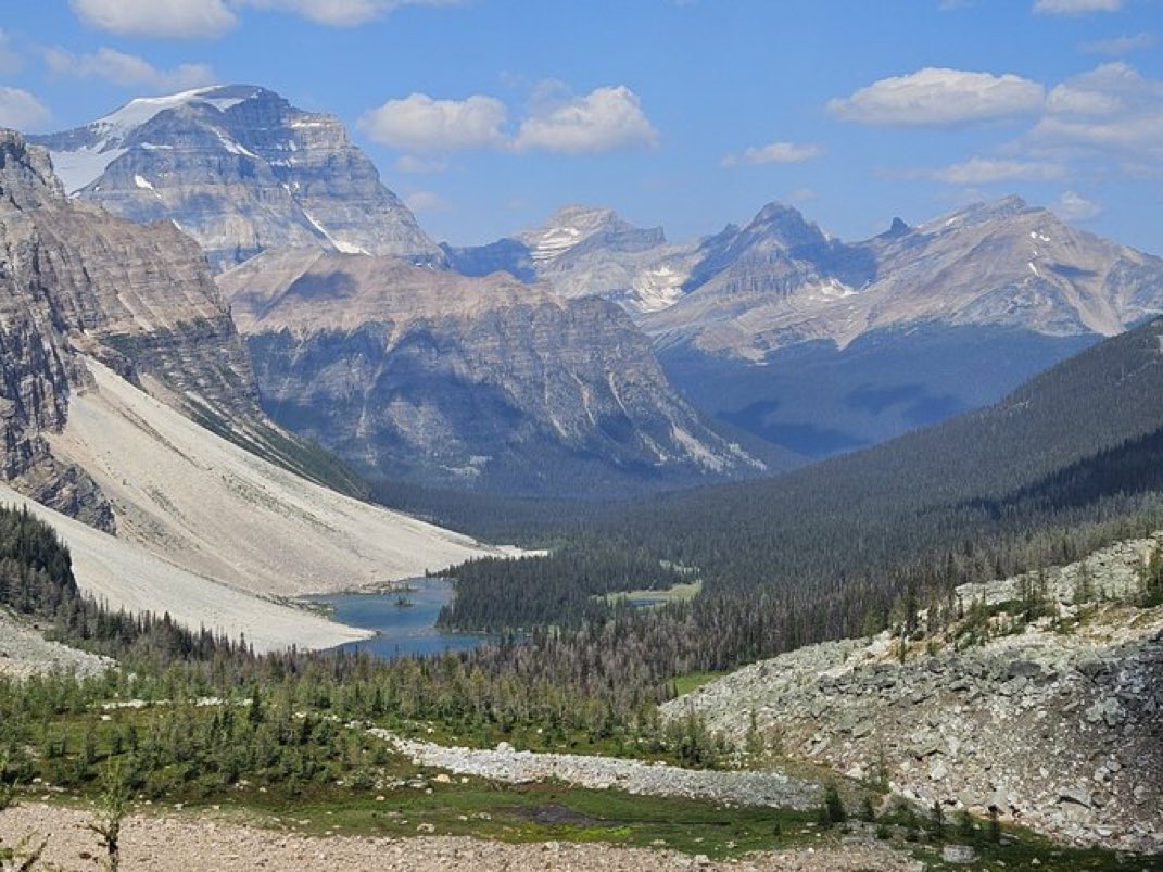 deninisc230's tweet photo. Back from a week long trip to the Canadian Rockies. This is the view from Whistling Pass in Banff National Park. Haiduk Lake can also be seen. The market was not kind to me during the trip but you gotta live life. https://t.co/yGmW2EwtHS