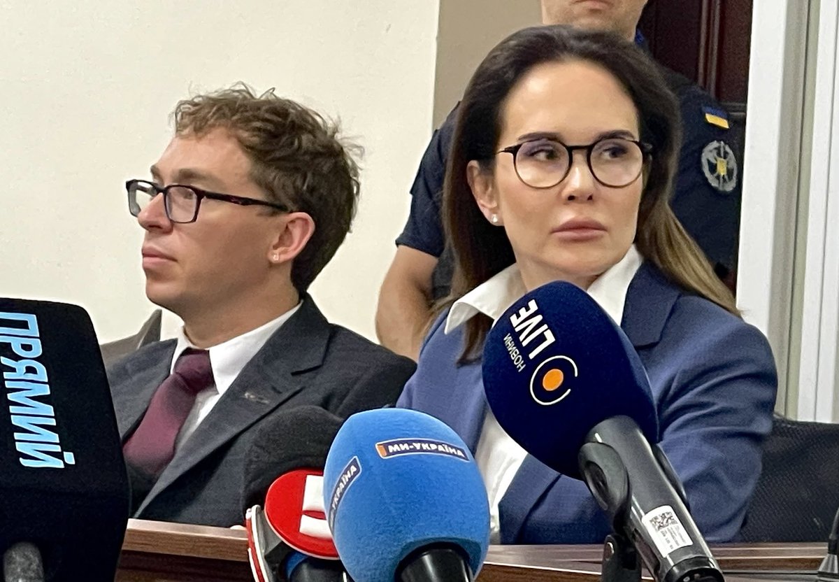 HavryshkoMarta's tweet photo. A court hearing is underway in Kyiv involving Iryna Mudra, Deputy Chief of Staff in Zelenskyy’s Office, who is accused of high-level corruption. 

In a rather shocking turn, Kyiv’s Chief Rabbi, Yonatan Binyamin Markovitch, has offered to stand surety for her.

I have to say: as a Jewish woman, I find it deeply shameful when a rabbi uses the moral authority of his position to shield someone accused of stealing from her own people in the middle of a war. 

A rabbi’s authority should stand for justice and integrity—not serve as a protective cover for the powerful when they face serious corruption allegations.

I, for one, would not attend a synagogue led by a rabbi who makes that choice.