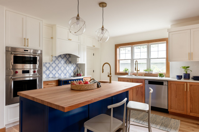 stevecsampson's tweet photo. Blue, White and Wood Kitchen Brings Character to a 1904 Home https://t.co/5FBzgpe952 https://t.co/Q30N7XfGSH