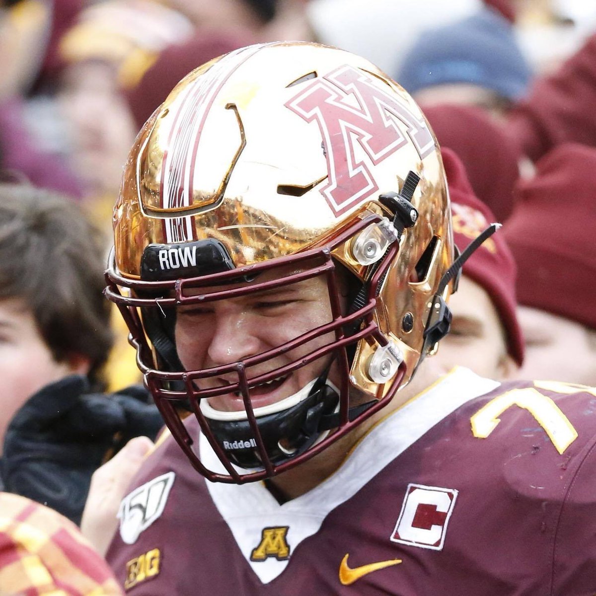 UNISWAG's tweet photo. The Gold Chrome lids are officially back for @GopherFootball this season.

#uniswag https://t.co/7ZyRNxdVjY