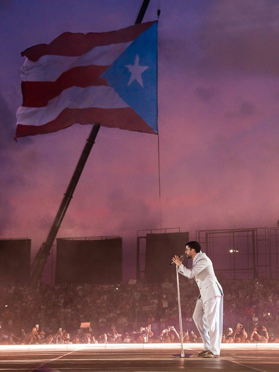 glittermagazine's tweet photo. Bad Bunny officially concluded his ‘DeBÍ TiRAR MÁS FOToS’ World Tour. 🌺 

Held at Estadio Hiram Bithorn, the Puerto Rican superstar was originally supposed to end his tour on July 18 in Italy. However, a month later, he announced two more shows as 'Cerramos en Casa' ('We're Closing it at Home'). 

As a whole, the tour grossed $467.5 million and sold 3.1 million tickets across 55 shows, now making him the highest-grossing and best-selling tour by a male Latin artist in history. 

As we bid farewell to the 'DtMF' era, we want to know: what was your favorite moment? 

#BadBunny #DtMF #Cerramosencasa