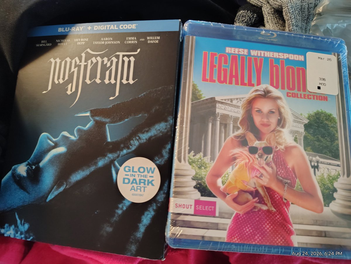 AJStone's tweet photo. Physical media haul was very Barbenheimer-coded today. 💞🎞️🩸 https://t.co/Qfcgc8htVD