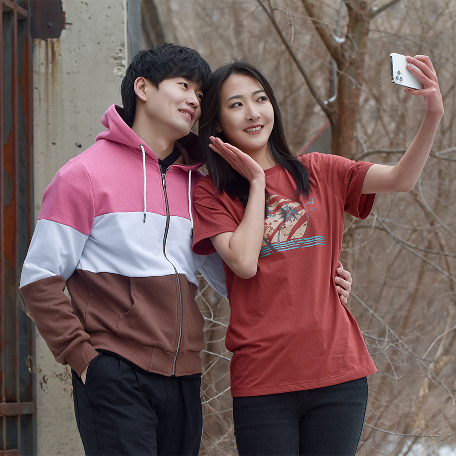 Models taking a selfie in IC gear