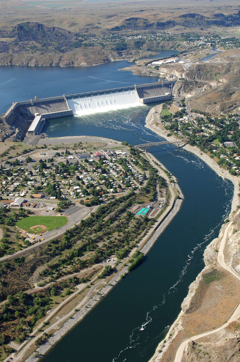 usbr's tweet photo. Hydropower:⚡Meet the Bureau of Reclamation’s largest.  

Grand Coulee Dam is BIG:  

⚡ 6,809 MW of generating capacity  
⚡ 33 generators  
⚡ 20 billion kWh average annual generation  
⚡ Power for about 2 million homes/year  
📏 550 feet tall  
📏 Just 57 feet short of a mile long  

Dam impressive. Powerfully Reclamation. ⚡  

📸1: Grand Coulee Dam spans the Columbia River in Washington state as water flows over the spillway.
📸2: Generating units line the John W. Keys III Pump-Generating Plant at Grand Coulee Dam in Washington state.
📸3: Generating units line the Right Powerhouse at Grand Coulee Dam in Washington state.
📸4: The Nathaniel “Nat” Washington Power Plant at Grand Coulee Dam in Washington state houses some of the dam’s largest generating units.

#Hydropower #HydroWorks #Reclamation