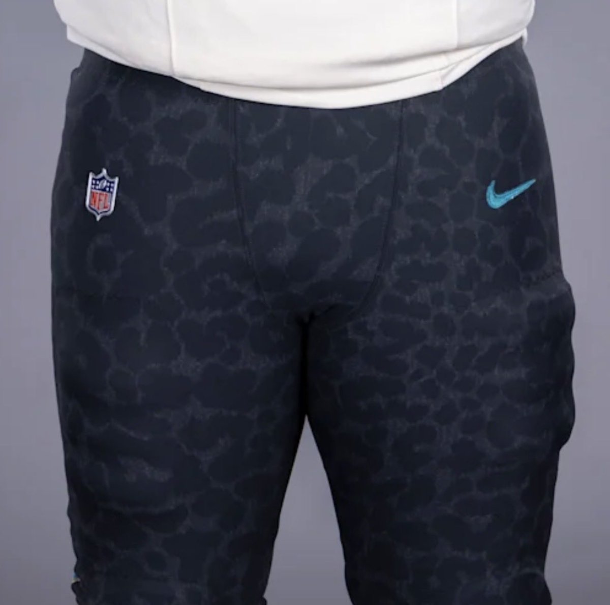 ZachCohenFB's tweet photo. Alright this is AWESOME, the Jaguars might have the best detail of any Rivalries uniform 🤯 

They have specific names of Jacksonville communities hidden subtly in their jaguar spots on their pants, like Southside, San Marco, etc. https://t.co/cgG3rX3xos